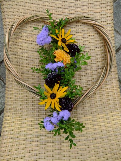 a photo of flowers encased in bamboo to represent eco friendly